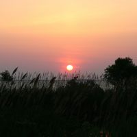 Sunset over the sound across from The Roanoke Island Inn